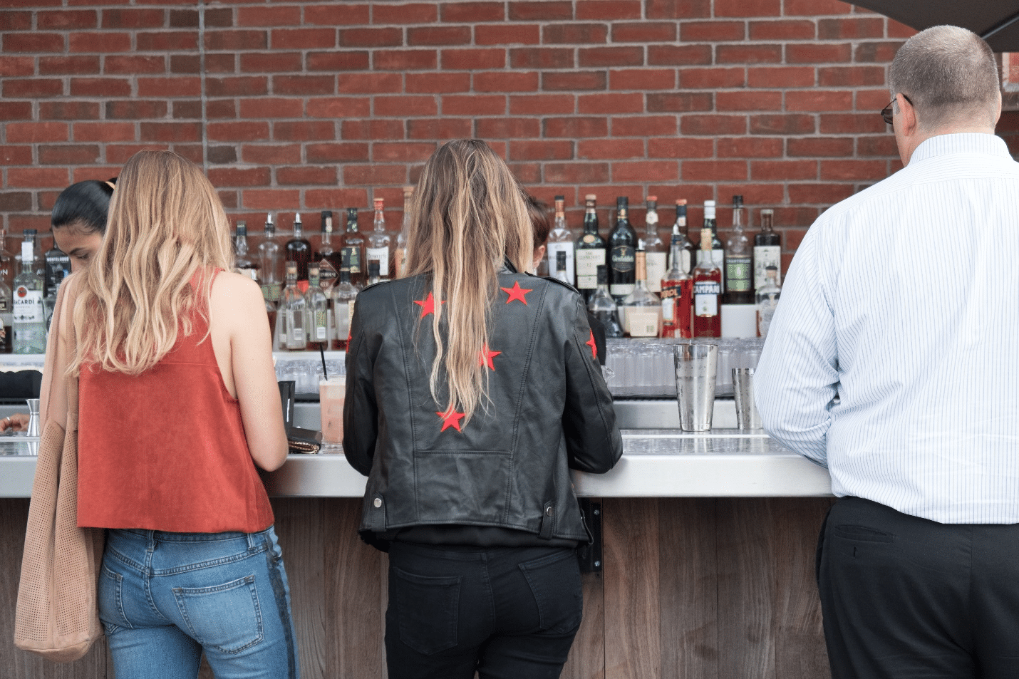 People waiting at a bar during a city trip to New York