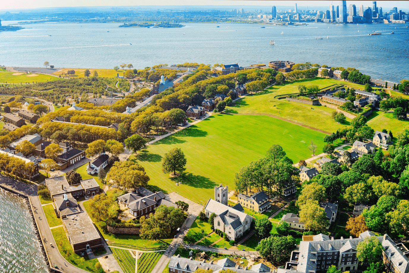 Aerial view of lush green gardens and estate at Governors Island.