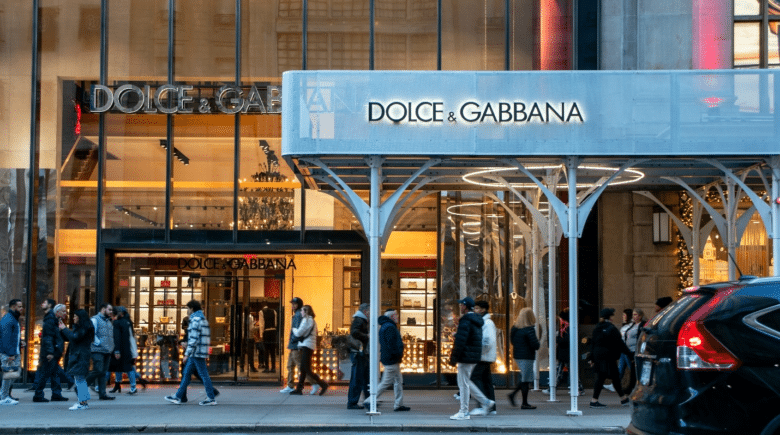 People walking in front of a store during a New York City travel guide