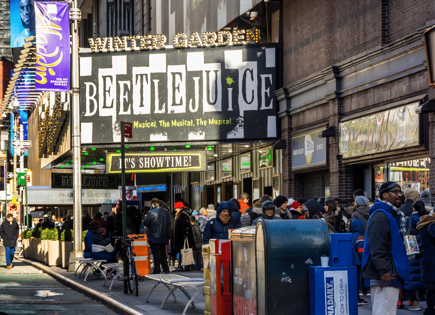 People queuing to watch Beetlejuice during a one-day sightseeing tour