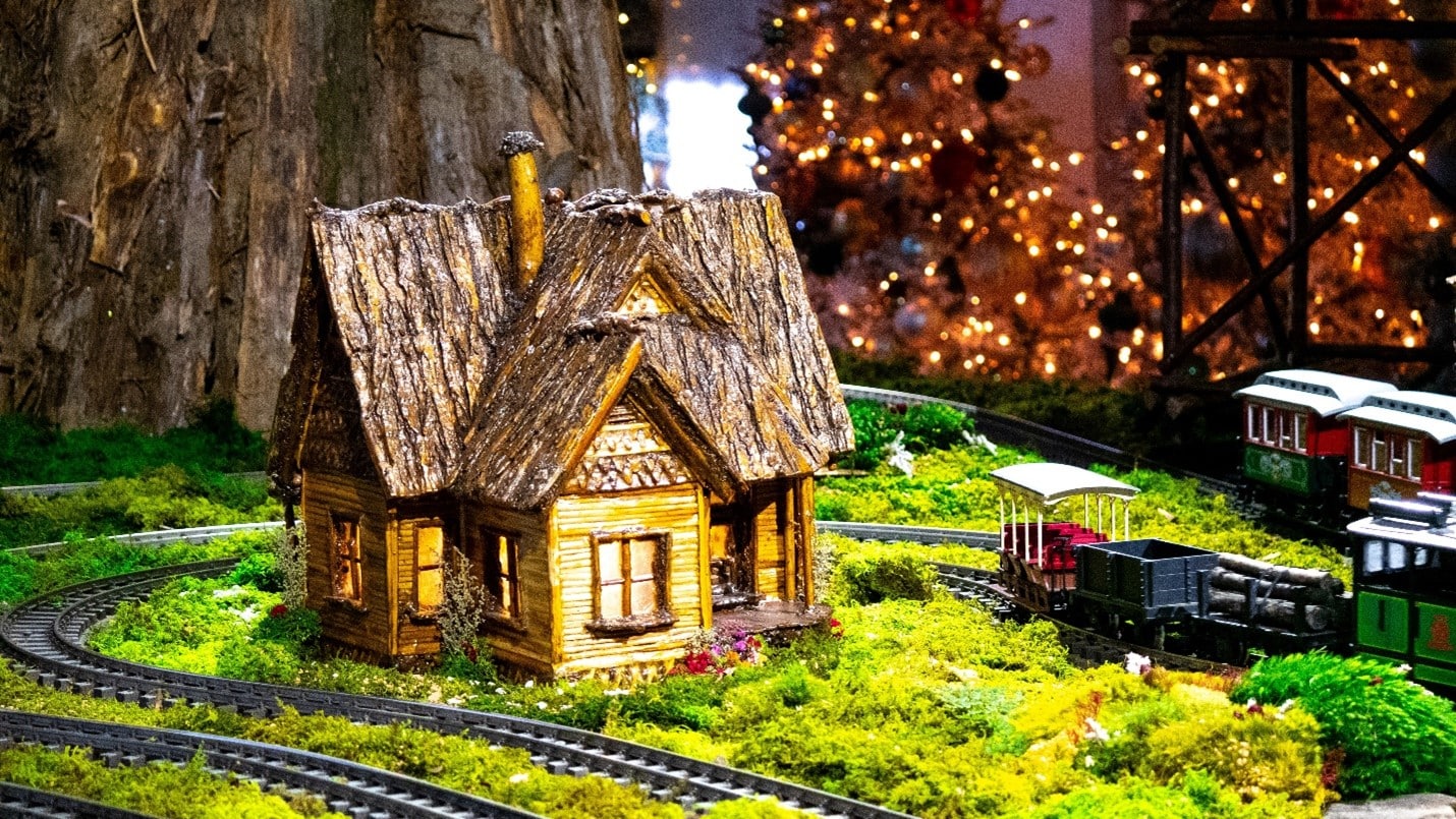 A mini-cabin with a train next to it seen during a one-day sightseeing tour