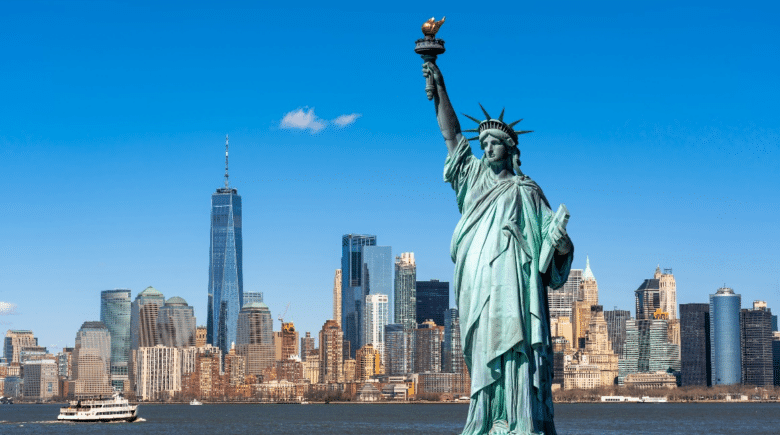 The Statue of Liberty with the New York Skyline in the background