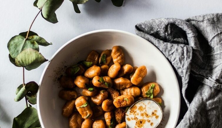 A bowl of gnocchi eaten during New York City travel guide