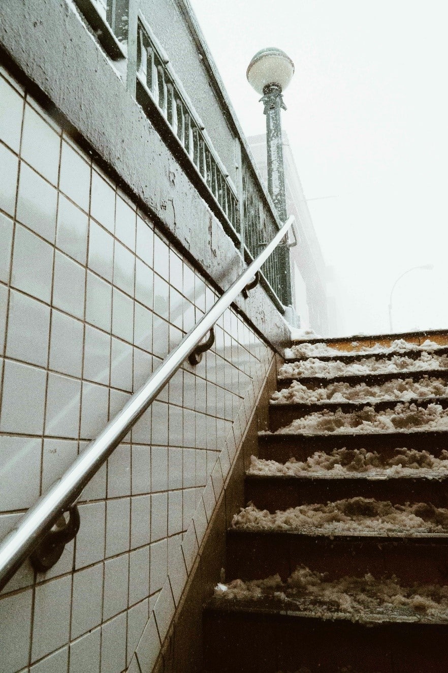 A staircase with snow on it seen a one-day sightseeing tour