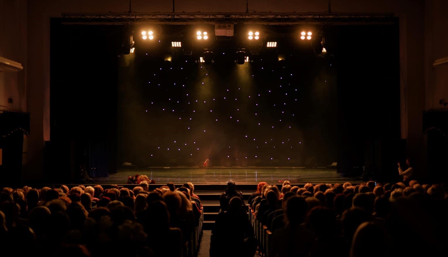 A Broadway theater with a full audience