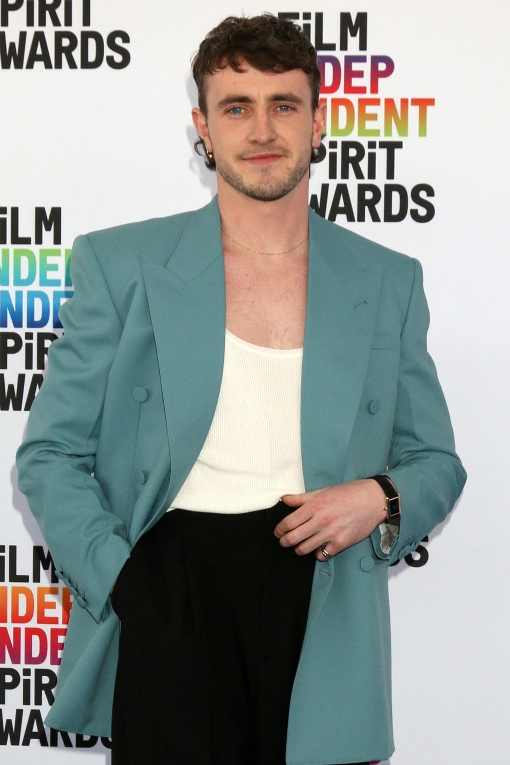 A blue eyed and black-haired male actor seen during a small group tour in New York City