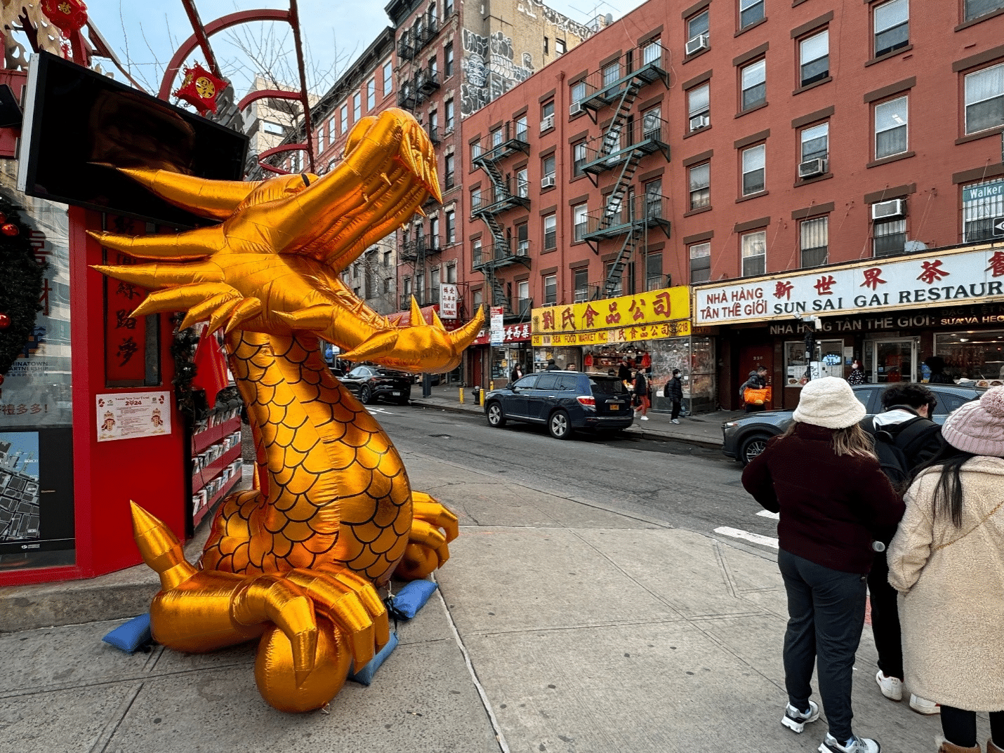 A statue of a golden dragon seen during a one-day sightseeing tour