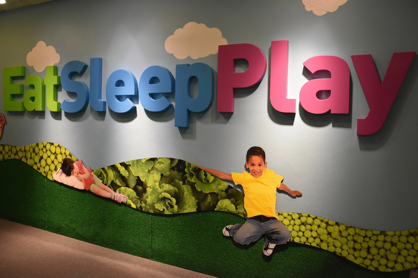 A sign saying âeat sleep playâ seen during a one-day sightseeing tour