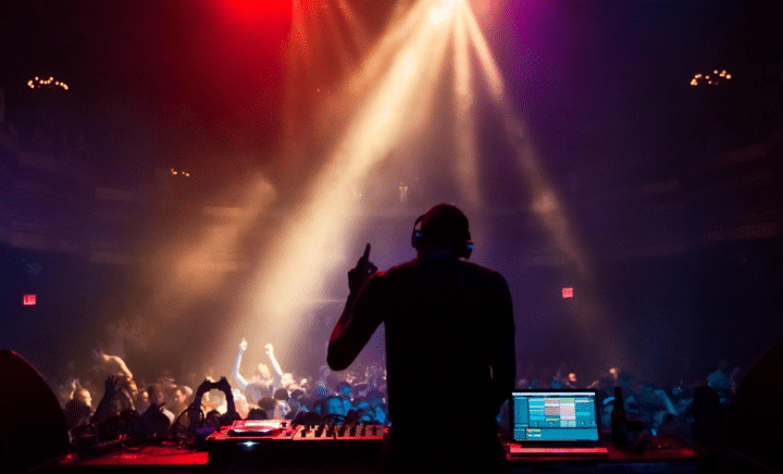 A DJ playing music at the club