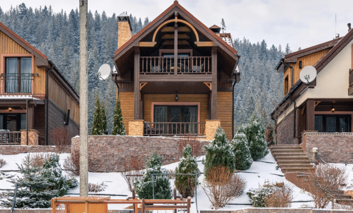 Wooden Houses in Snow