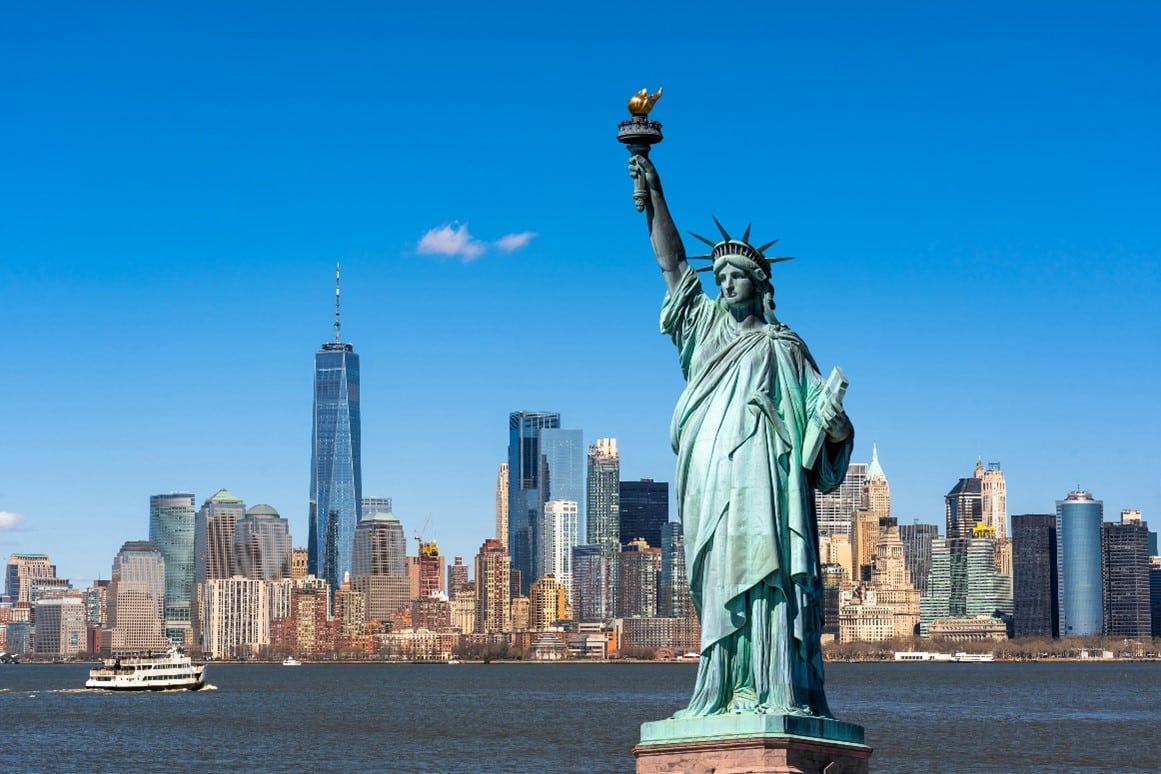 The Statue of Liberty with the New York Skyline in the background
