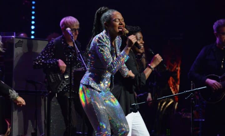 A female singer performing on stage