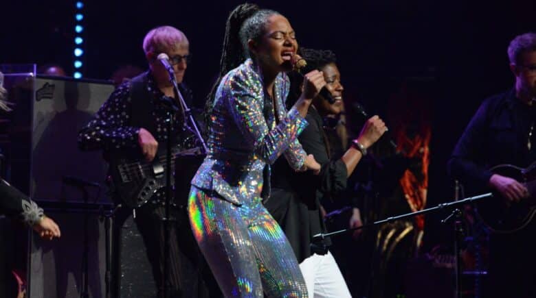 A female singer performing on stage
