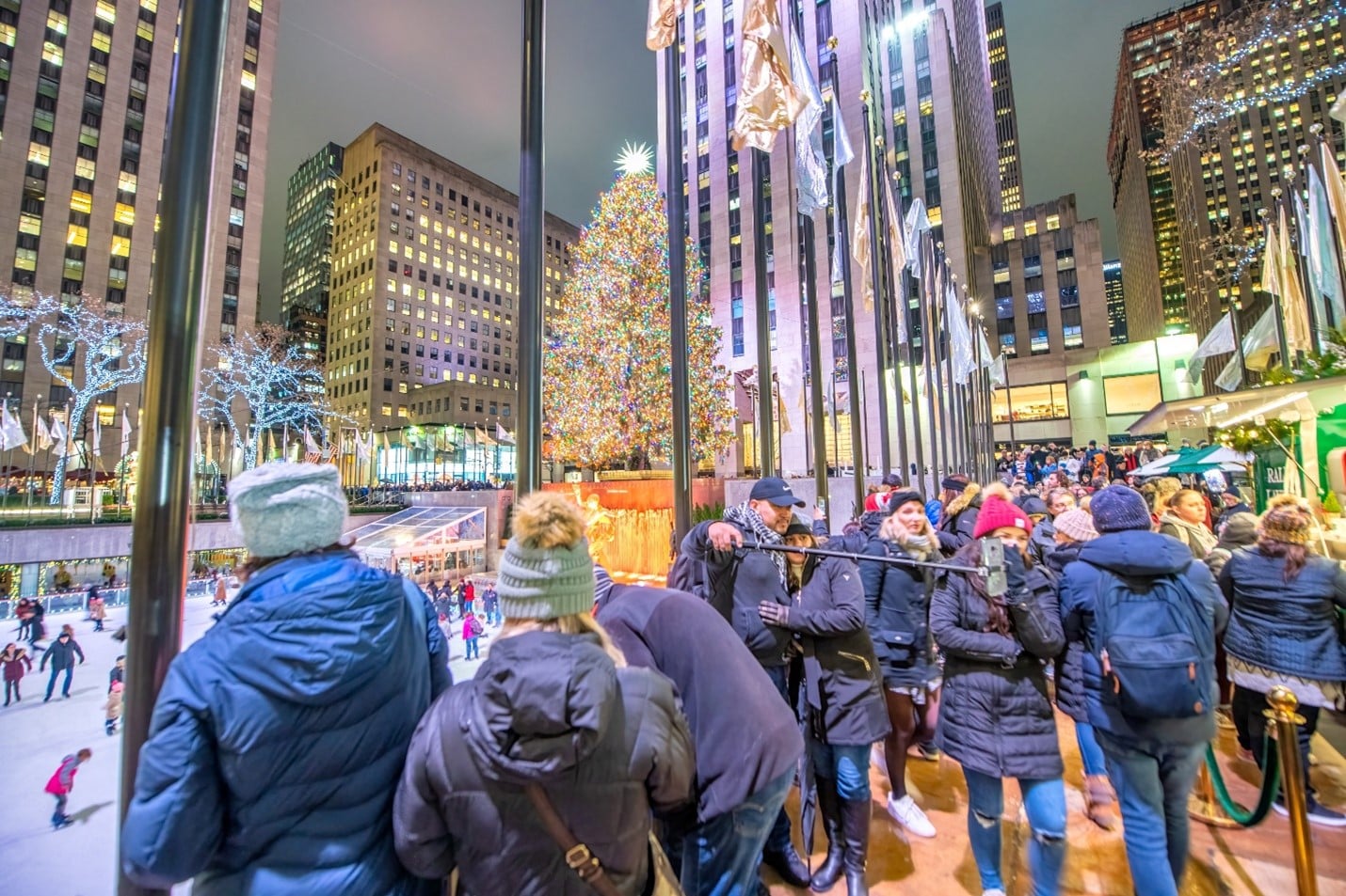 A group of people waiting to ice-skate during a one-day sightseeing tour