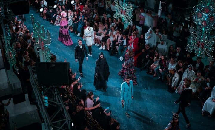 Models going down the runway during a fashion show in a city trip to New York