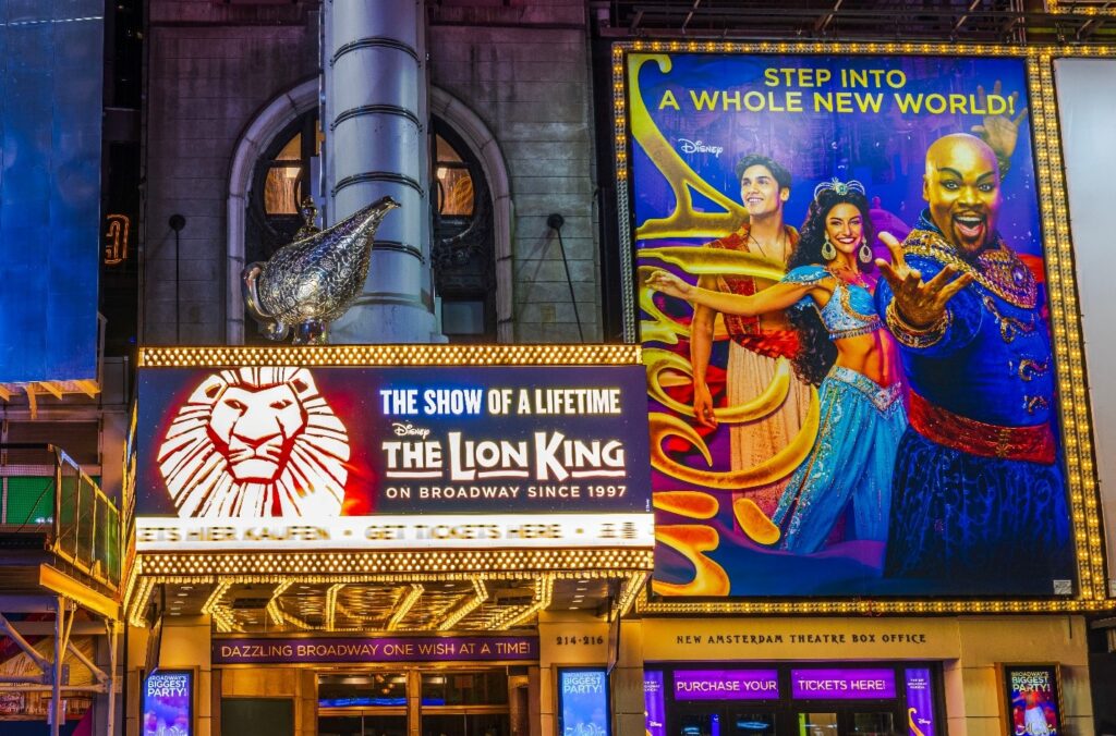 Broadway shows billboards, including Disney's Aladdin.