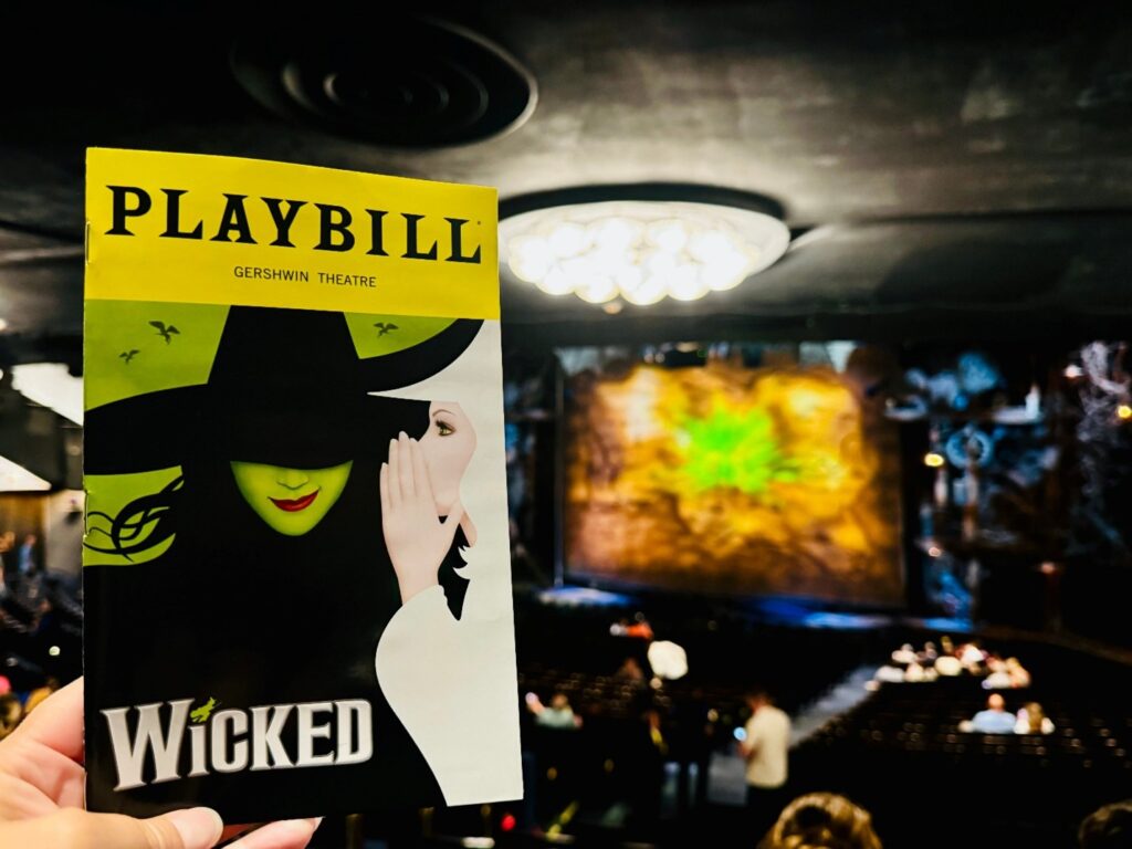 A Broadway theater marquee featuring Wicked.