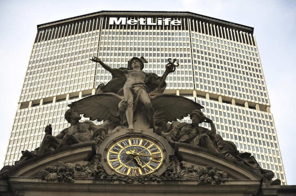 A statue in front of a large building seen during a city trip to New York