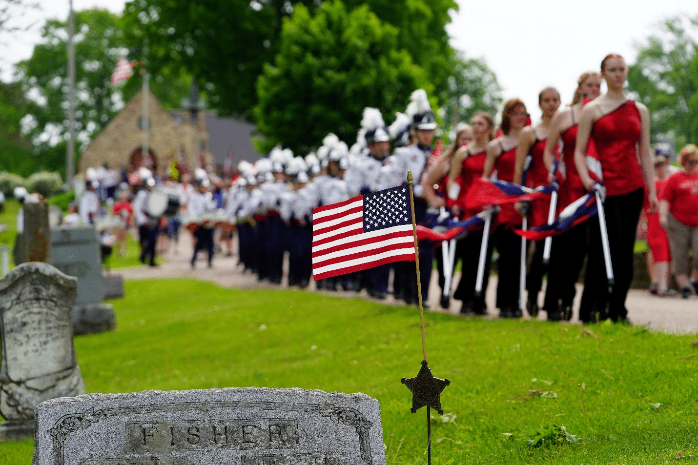 People visiting a graveyard during a one-day sightseeing tour