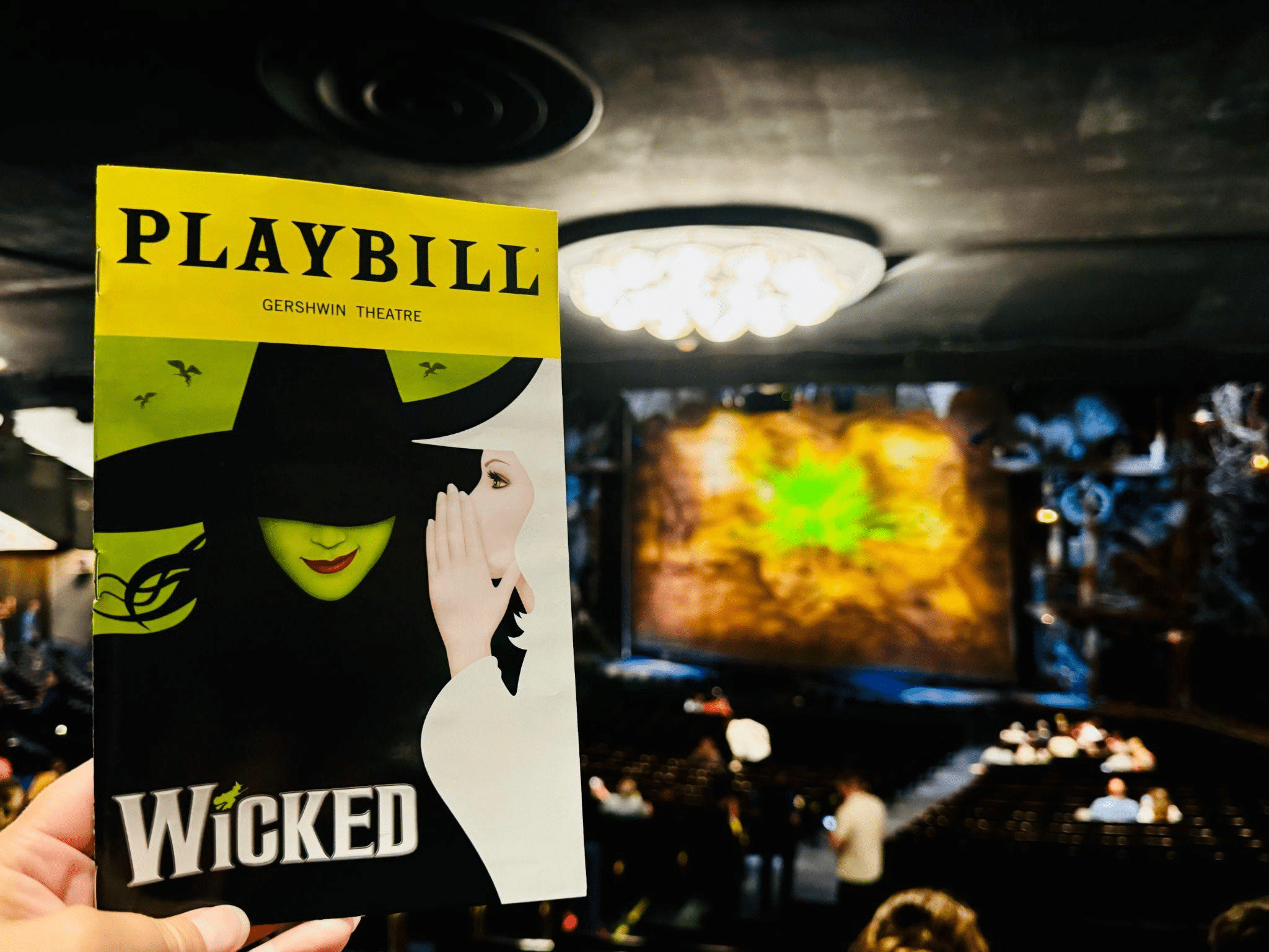 Official Wicked Broadway poster featuring Elphaba and Glinda.