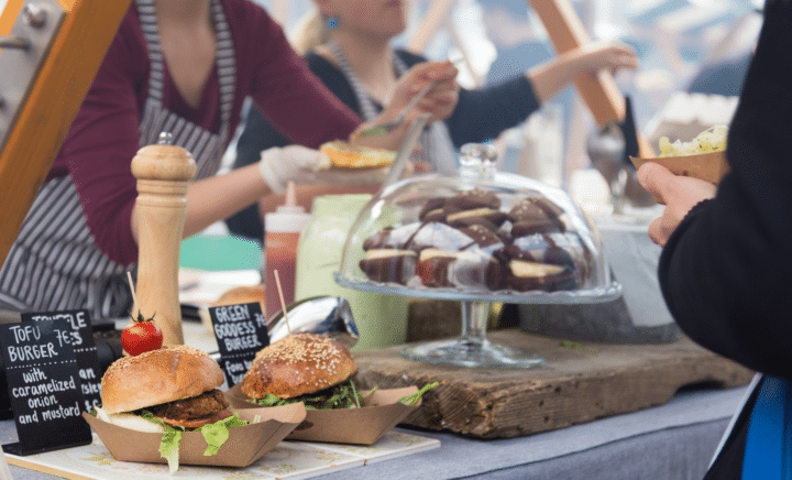 A stall selling burgers and desserts during a one-day sightseeing tour