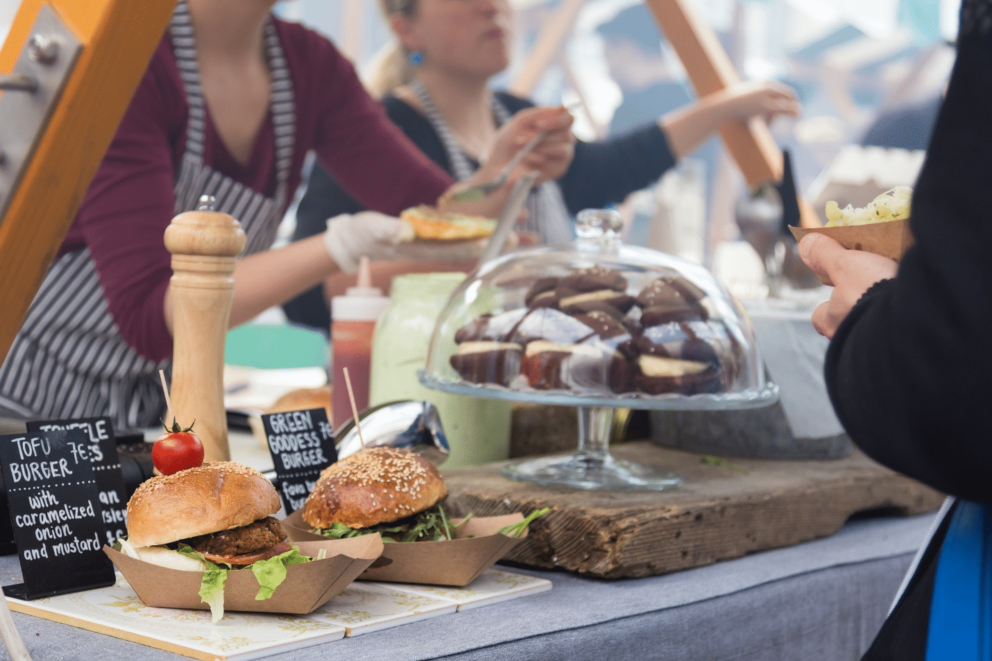 A stall selling burgers and desserts during a one-day sightseeing tour