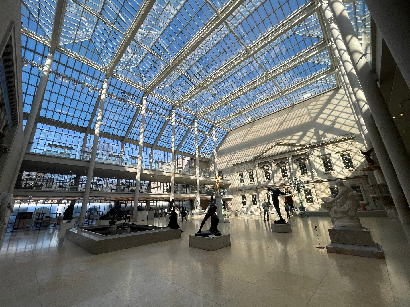 A gallery of statues during a New York City travel guide