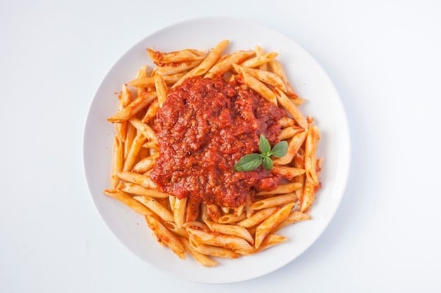 A bowl of pasta with marinara sauce seen during aone-day sightseeing tour