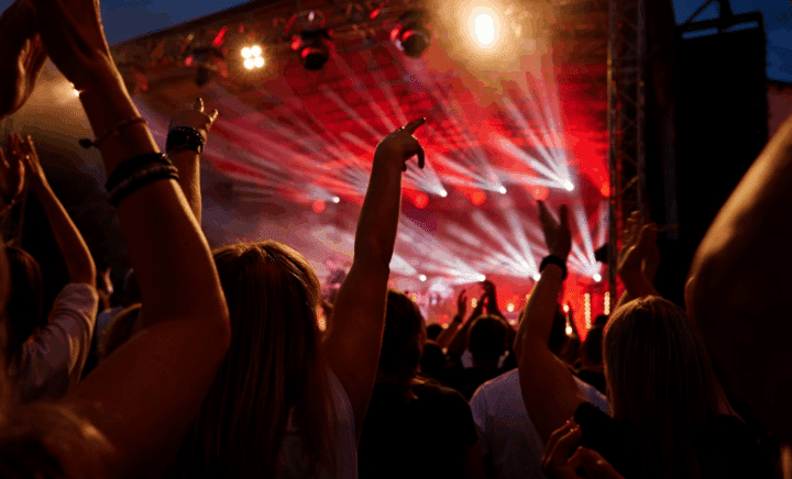People at a concert with red lights