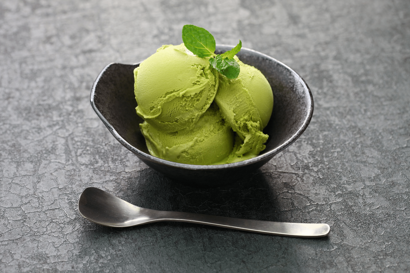 A bowl of green ice cream seen during a New York City travel guide