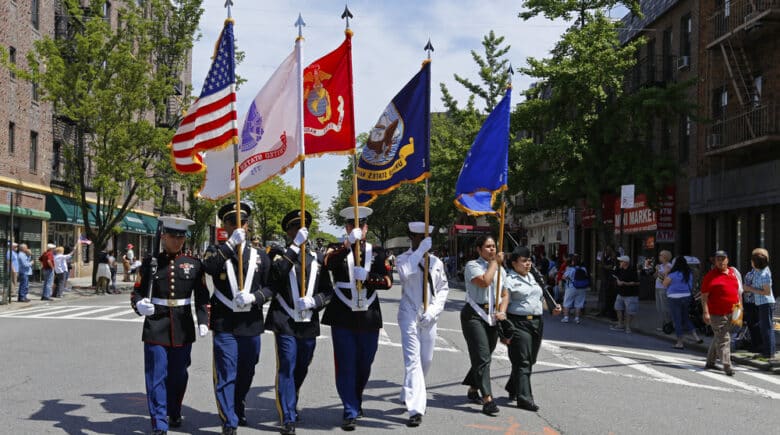 NEW YORK CITY - MAY 26 2014: The 146th annual King's County Memorial Day Parade, one of the nation's oldest, honored fallen & living veterans in the streets of Bay Ridge, Brooklyn. Color guard on 3rd