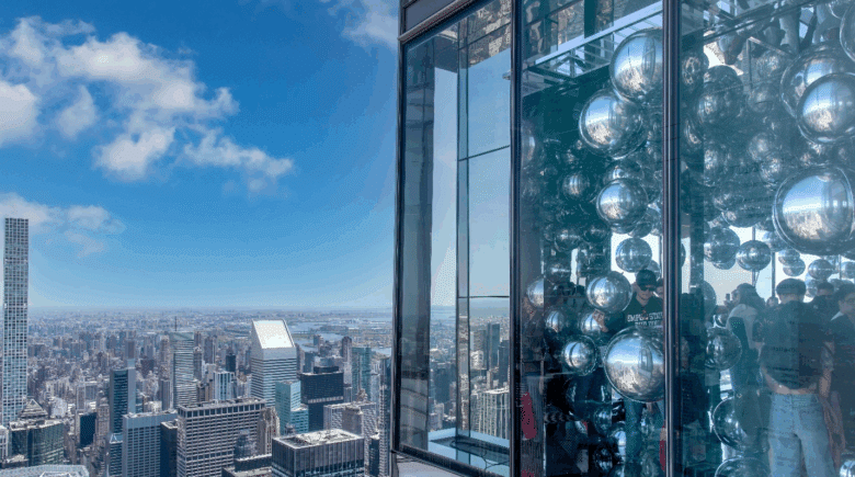 Balloons and people seen through the windows of Summit Vanderbilt