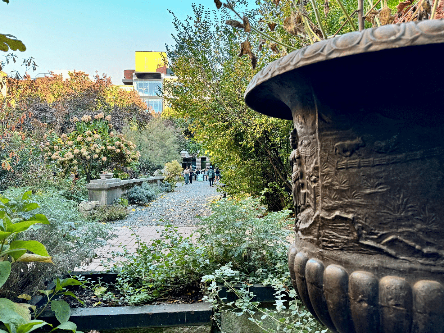 People walking through Elizabeth Street Garden