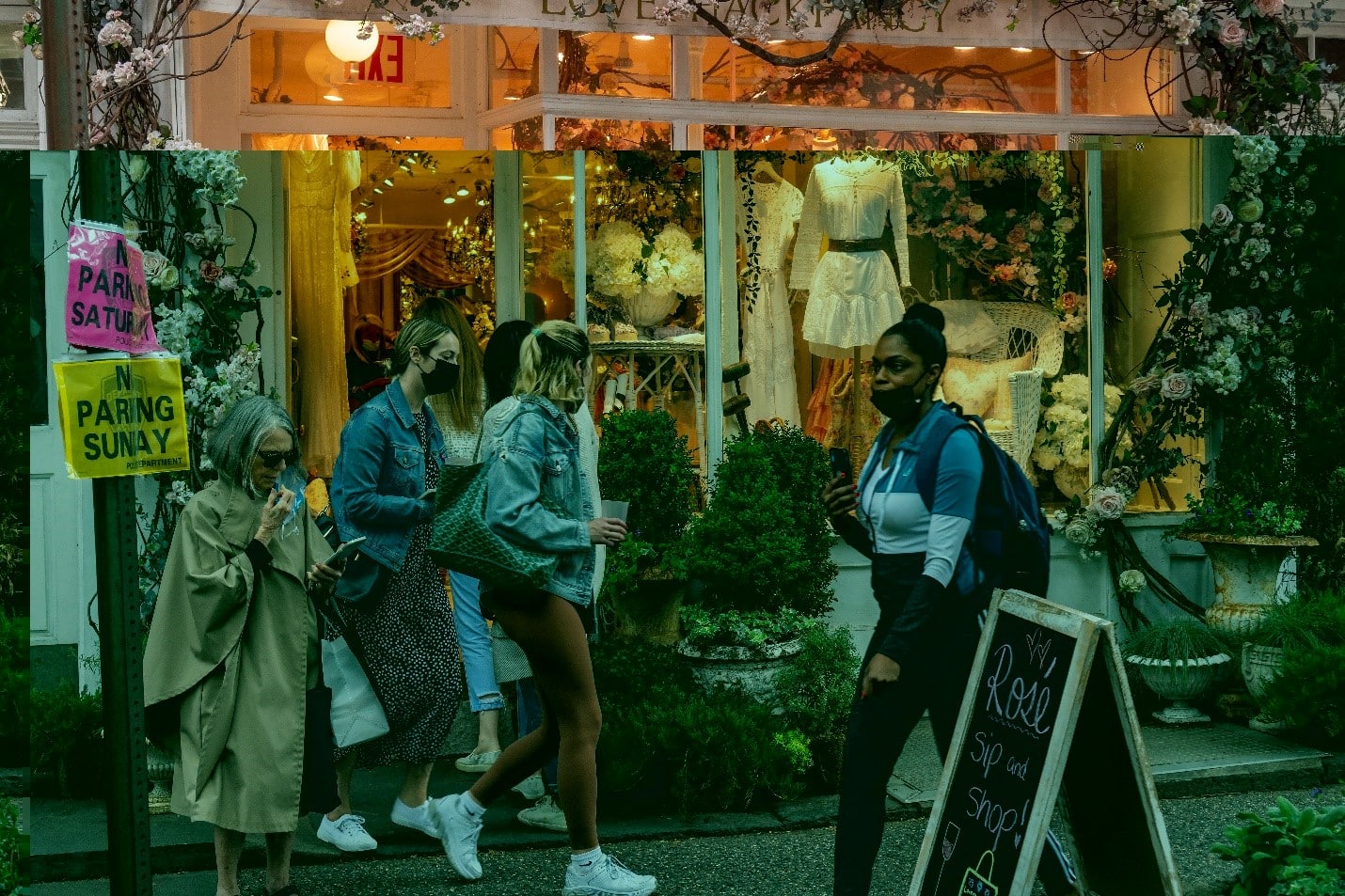 People walking by a store in Bleecker Street