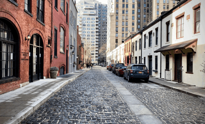 Cobblestone street view of Washington Mews in Greenwich Village, New York City