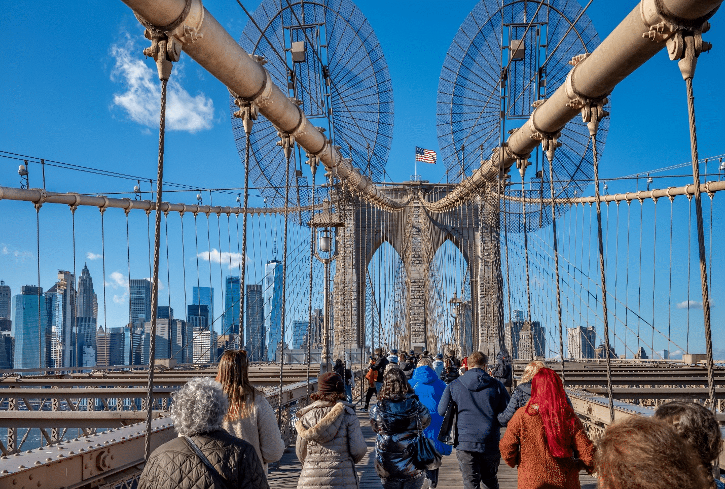 A picture of tourists at the Brooklyn Bridge