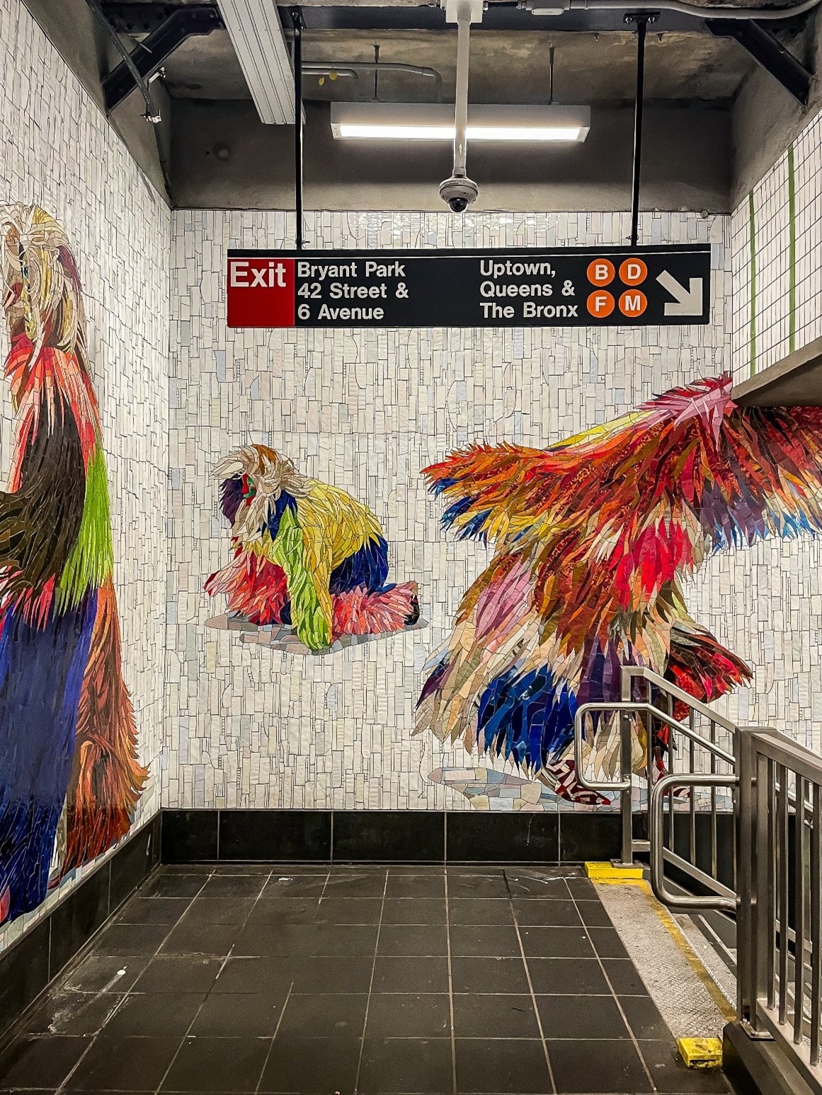 Colorful depictions of human figures on a wall