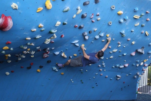 Indoor climbing wall with colorful holds