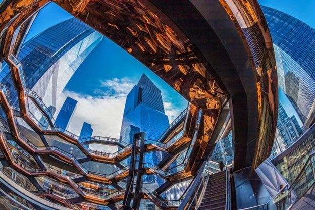 Wide-angle view of the Vessel and nearby skyscrapers in Hudson Yards
