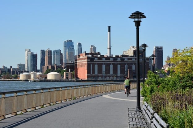 A picture of a person biking near East River