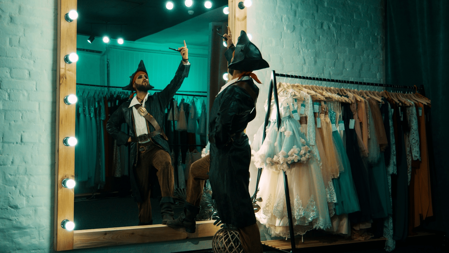 A picture of a person wearing a costume backstage