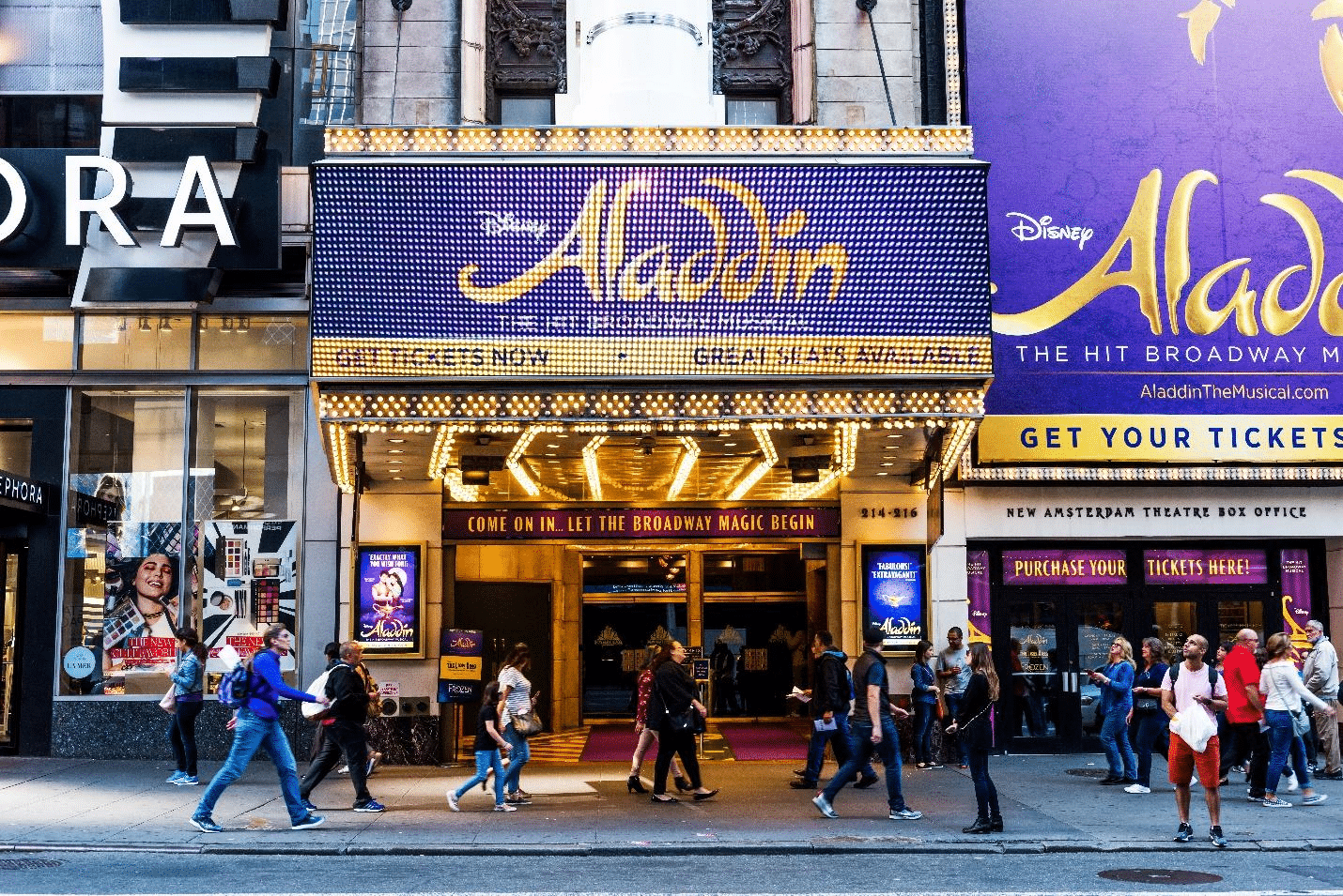 A picture of the Aladdin billboard at Broadway theater