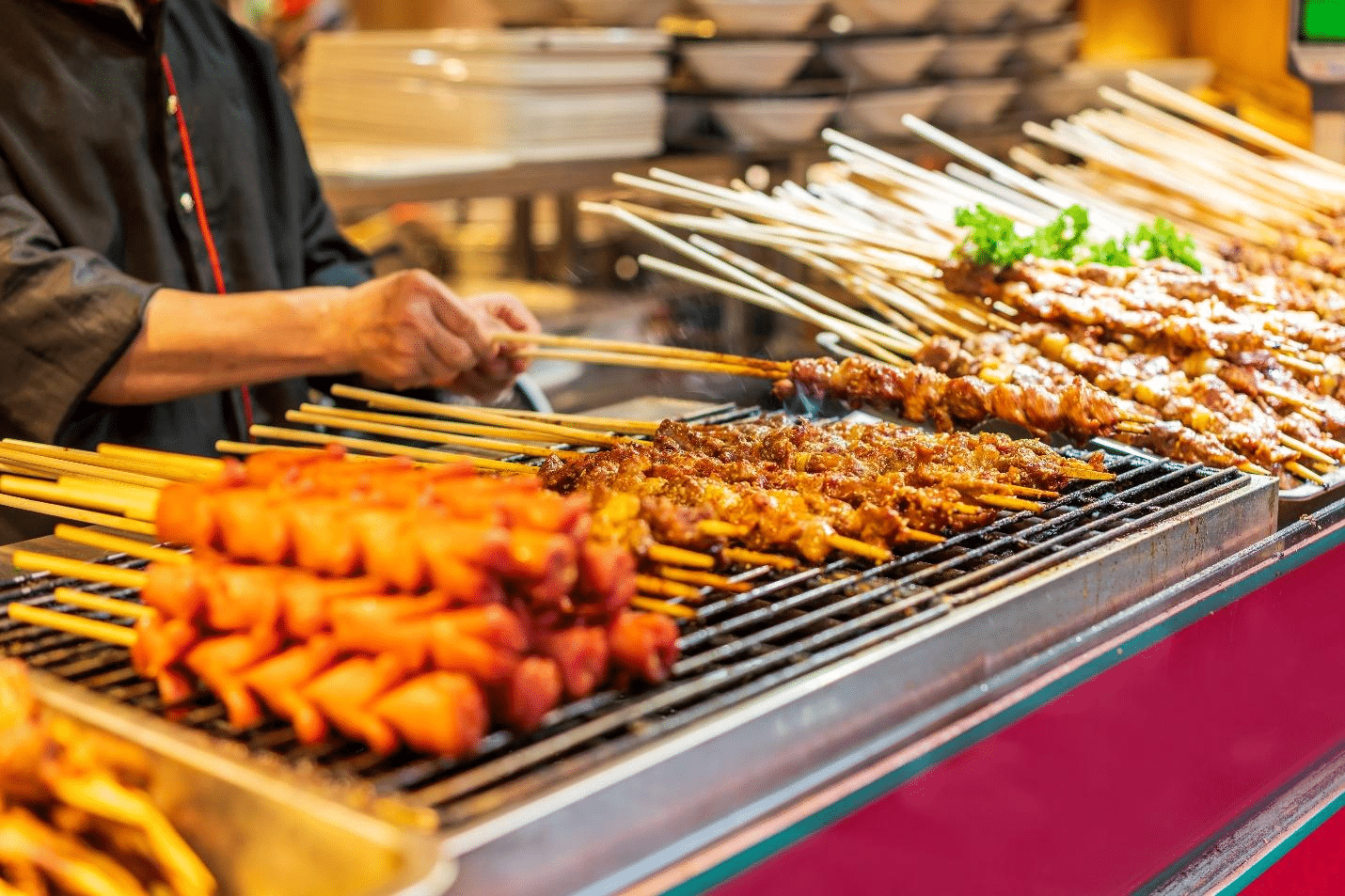 A picture of a chef cooking BBQ