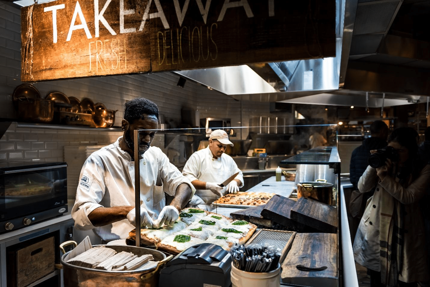 A picture of chefs in the kitchen