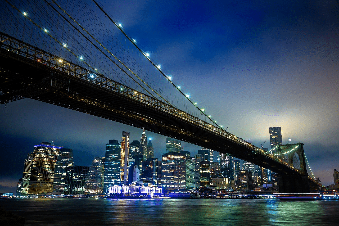 Brooklyn Bridge from below at night