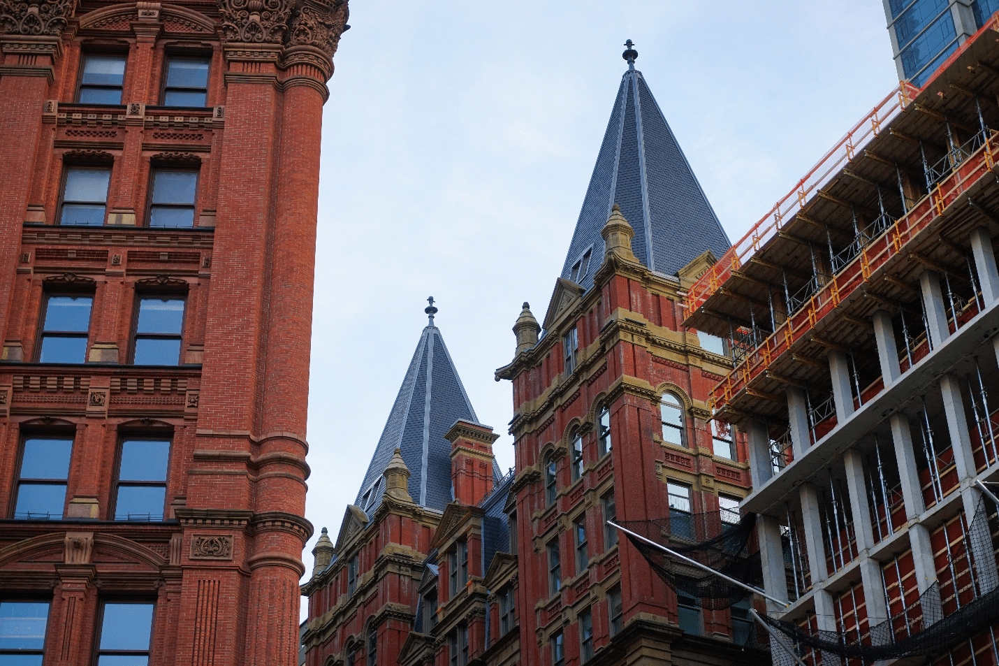 The red exterior of The Beekman, a Thompson Hotel