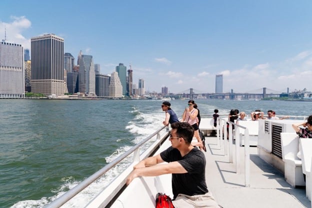 A picture of people in a boat tour