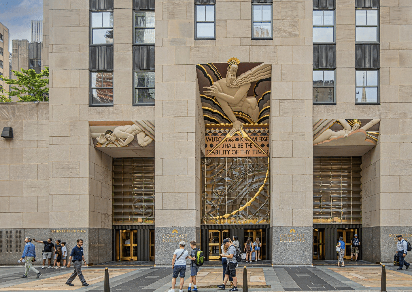 People standing outside the Rockefeller Plaza