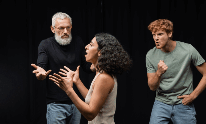 Broadway actors on stage.