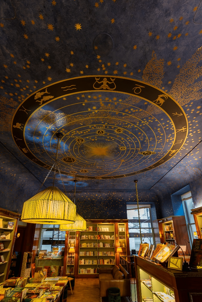 Large painting on the ceiling in Albertine Books in Manhattan